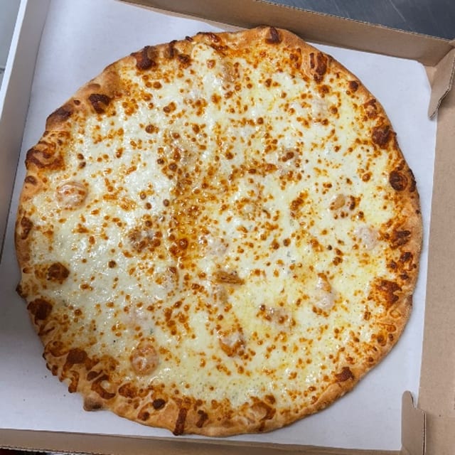 Shrimp Alfredo Pizza.